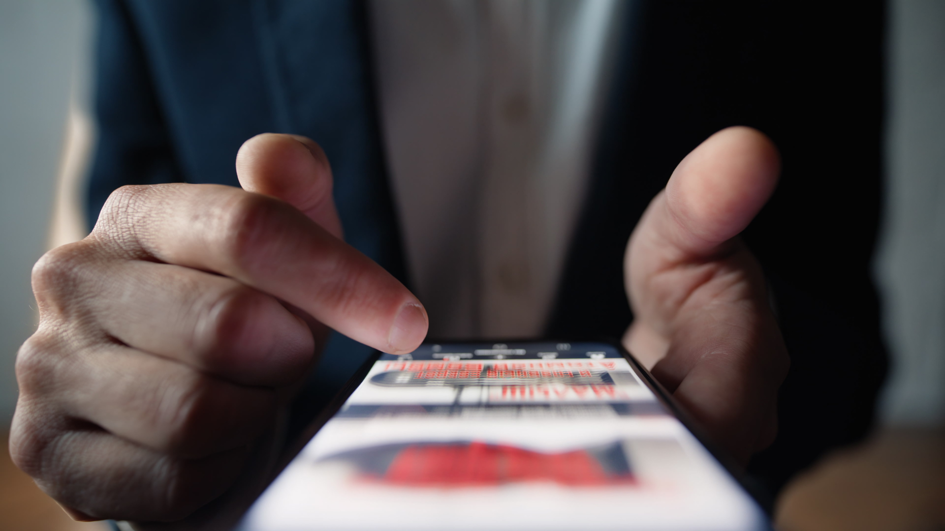 Fingers moving mobile display checking social media feed online indoors closeup